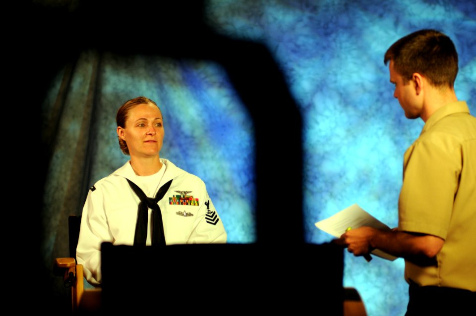 US Navy 110516-N-AD372-088 Aircrew Survival Equipmentman 1st Class Amy Davis, U.S. Fleet Forces Sailor of the Year, prepares to be interviewed at D