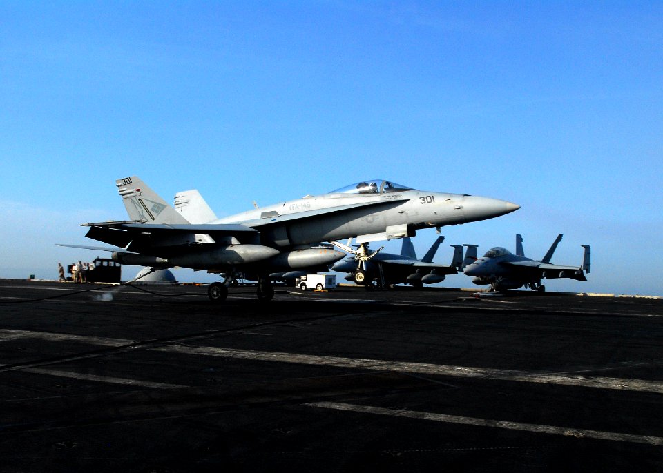 US Navy 110518-N-SB672-163 An F-A-18C Hornet assigned to the Blue Diamonds of Strike Fighter Squadron (VFA) 146 makes an arrested landing on the fl