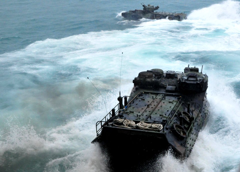 US Navy 110518-N-XR557-019 Amphibious assault vehicles exit the amphibious dock landing ship USS Tortuga (LSD 46)