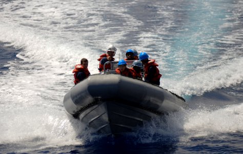 US Navy 110519-N-AQ172-129 Sailors ride in a rigid-hull inflatable boat during small boat training in the Mediterranean Sea
