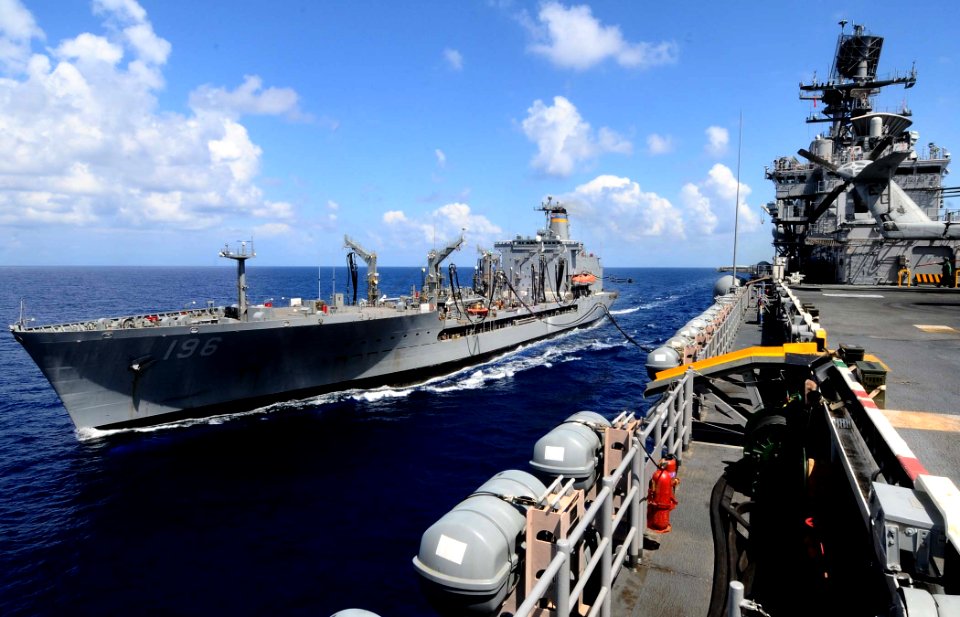 US Navy 110518-N-7508R-001 The Military Sealift Command fleet replenishment oiler USNS Kanawha (T-AO 196) conducts a replenishment at sea with the