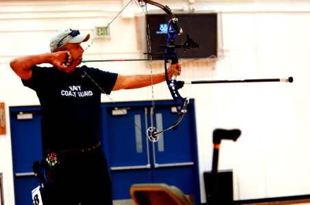 US Navy 110519-N-CD297-007 Retired Chief Electrician's Mate Peter Allen Johns participates in the Compound Archery competition at the second annual
