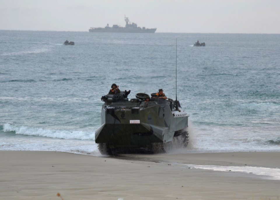 US Navy 110518-N-VA590-081 A Royal Thai Marine Corps amphibious assault vehicle drives onto the beach during an amphibious assault exercise as part