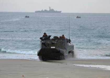 US Navy 110518-N-VA590-081 A Royal Thai Marine Corps amphibious assault vehicle drives onto the beach during an amphibious assault exercise as part