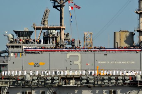 US Navy 110516-N-QY430-035 Sailors man the rails as the amphibious assault ship USS Kearsarge (LHD 3) returns to Naval Station Norfolk after comple