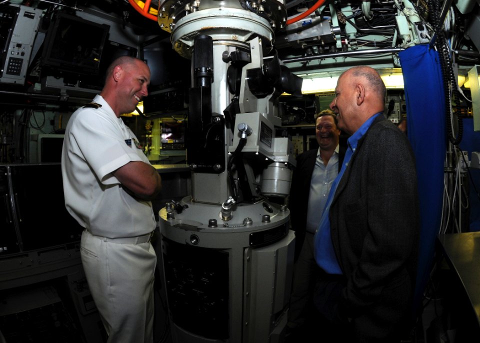 US Navy 110517-N-UE250-069 Lt. Ron Hatt, left, weapons officer aboard the Los Angeles-class fast attack submarine USS Hampton (SSN 767)