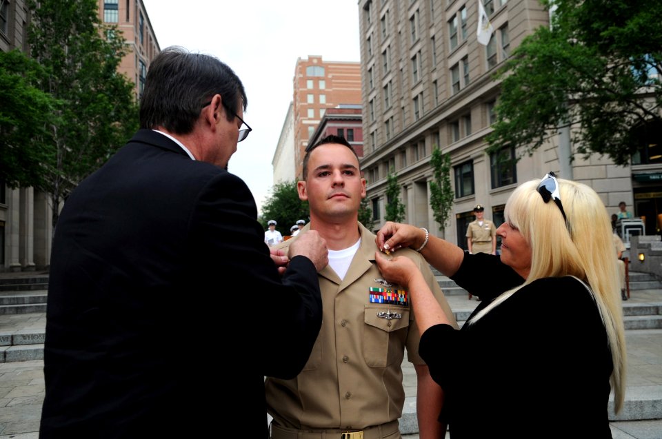 US Navy 110519-N-AD372-002 Chief Hospital Corpsman Andrew Jenkins, U.S. Pacific Fleet Sailor of the Year, receives his chief's anchors