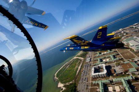 US Navy 110517-N-BA418-006 Pilots assigned to the U.S. Navy flight demonstration squadron, the Blue Angels, fly F-A-18 Hornet strike fighters over photo