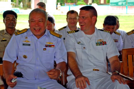 US Navy 110519-N-VP123-240 Royal Thai Navy Rear Adm. Chaiyot Sundaranaga, left, and Capt. David Welch share a laugh before the dedication for a CAR