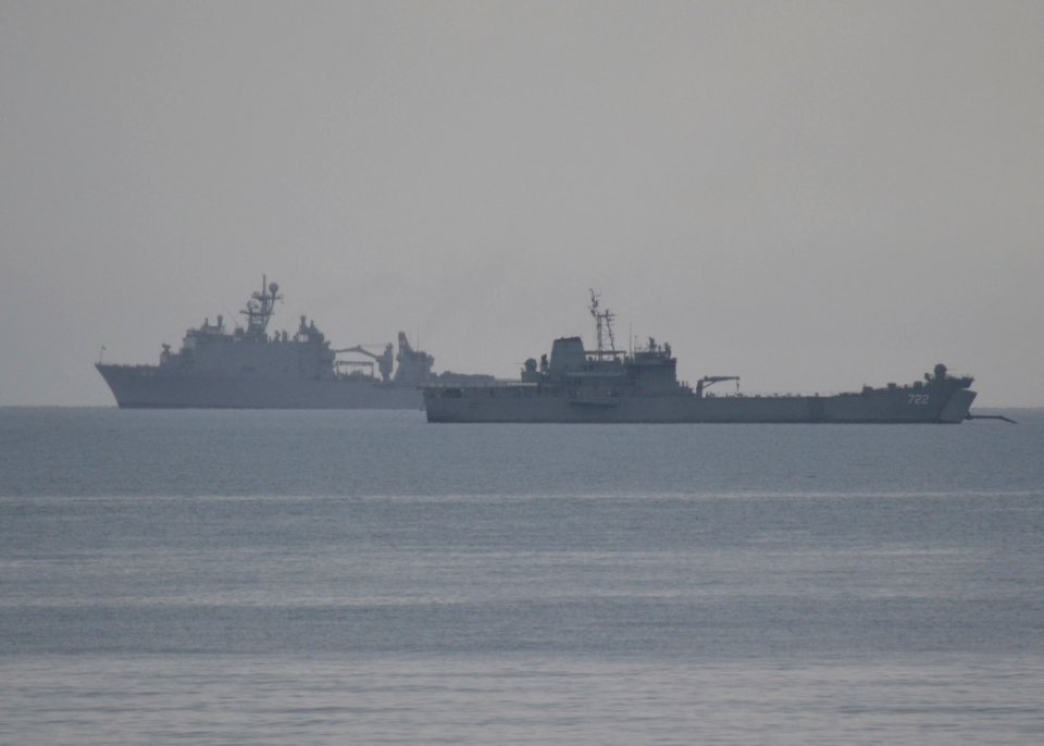 US Navy 110518-N-VA590-227 The Royal Thai Navy medium landing ship HTMS Surin (LST 722), foreground, and the amphibious dock landing ship USS Tortu