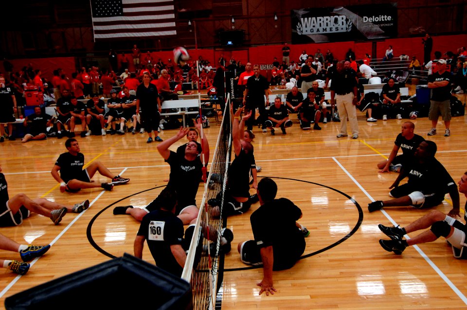US Navy 110517-N-CD297-109 Members from Team Navy-Coast Guard volley against members of the U.S. Army sitting volleyball team during a preliminary