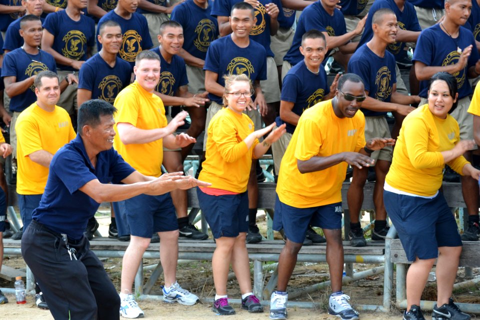 US Navy 110519-N-VA590-271 U.S. and Royal Thai Navy sailors perform a cheer during a soccer match at Nong Prue Municipality Sports Field