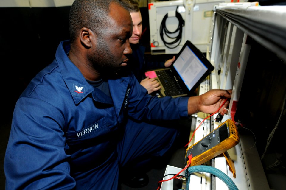 US Navy 110518-N-QL471-274 Aviation Support Equipment Technician 3rd Class Lionell T. Vernon, assigned to the aviation intermediate maintenance dep