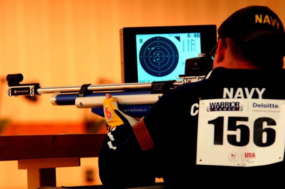 US Navy 110519-N-CD297-025 Hospital Corpsman 2nd Class Tyler T. Burdick, from Team Navy-Coast Guard, takes aim in the 10-meter Air Rifle shooting c