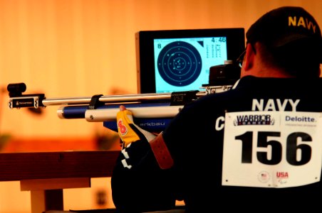 US Navy 110519-N-CD297-025 Hospital Corpsman 2nd Class Tyler T. Burdick, from Team Navy-Coast Guard, takes aim in the 10-meter Air Rifle shooting c