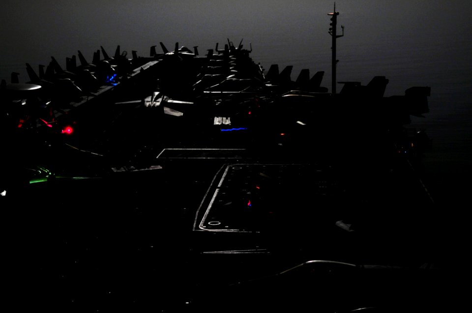 US Navy 110518-N-UO379-065 Sailors and Marines conduct aircraft maintenance on the flight deck of the aircraft carrier USS Ronald Reagan (CVN 76) u