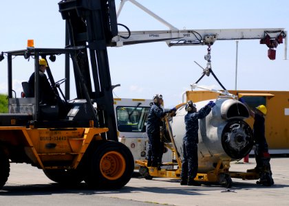 US Navy 110519-N-ZK021-001 Sailors assigned to Fleet Readiness Center Northwest at Naval Air Station Whidbey Island prepare to install a P-3 Orion