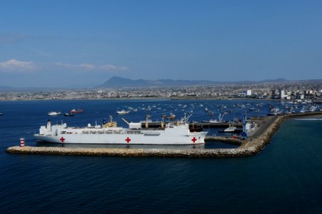 US Navy 110521-F-CF975-028 The Military Sealift Command hospital ship USNS Comfort (T-AH 20) is pierside during a scheduled port visit to Manta, Ec photo