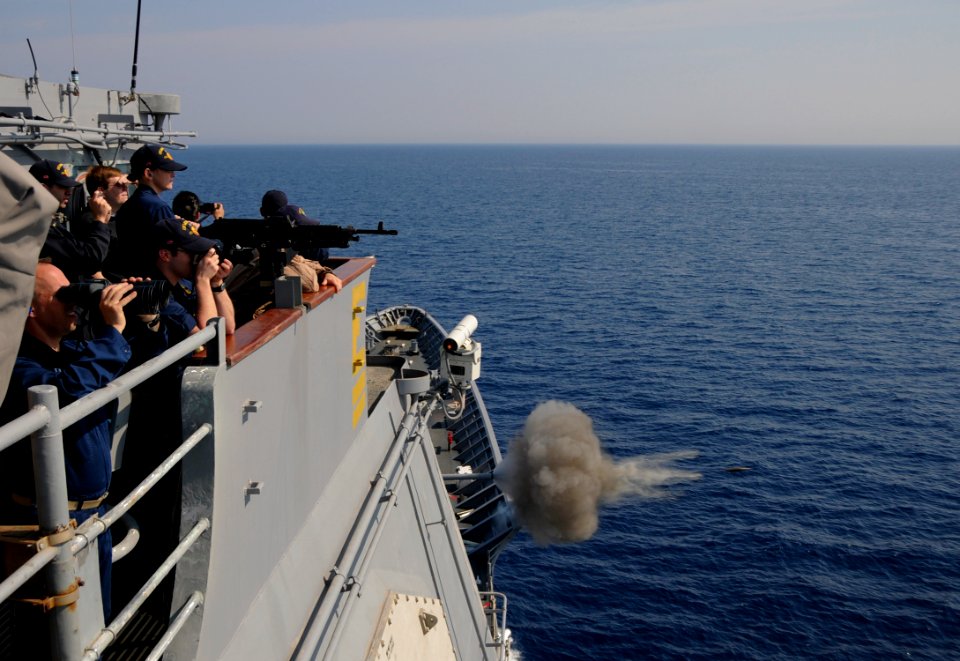 US Navy 110521-N-AQ172-387 Crew members of the Ticonderoga-class guided-missile cruiser USS Monterey (CG 61) observe as the ships weapons departmen