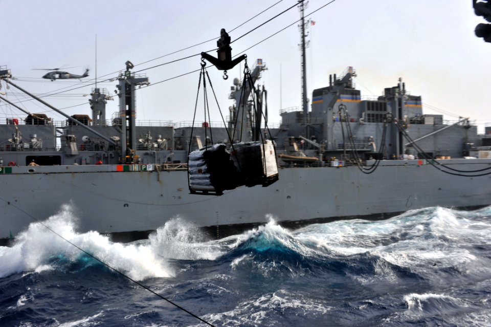 US Navy 110519-N-0569K-035 The aircraft carrier USS Enterprise (CVN 65) receives supplies from the Military Sealift Command fast combat support sh
