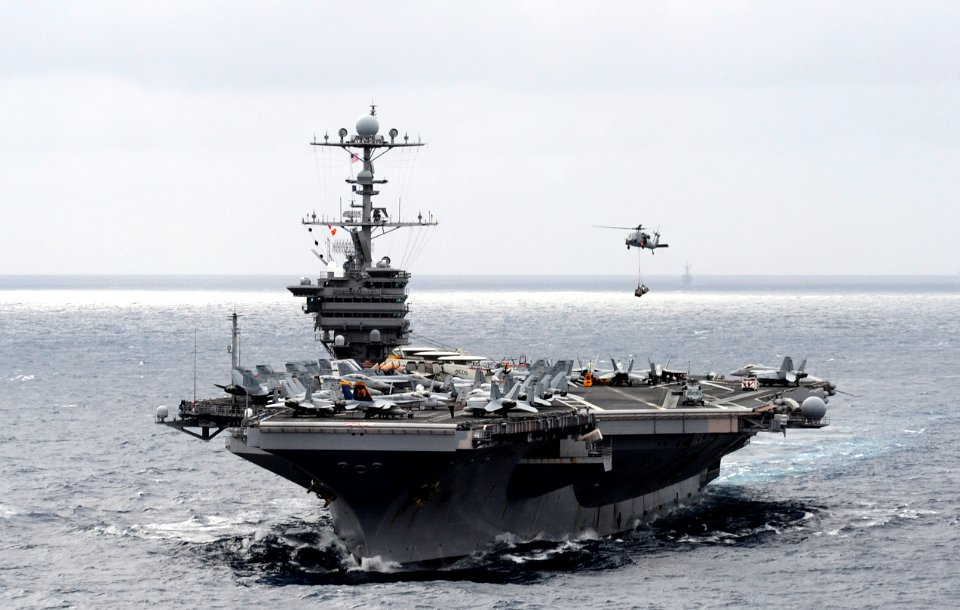 US Navy 110519-N-OI955-214 The Nimitz-class aircraft carrier USS John C. Stennis (CVN 74) is underway in the Pacific Ocean during a vertical replen