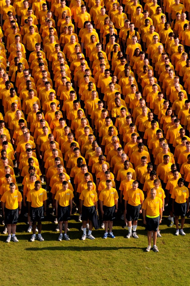 US Navy 110520-N-GS507-784 Staff and students at the Center for Information Dominance (CID) Corry Station participate in morning colors during the