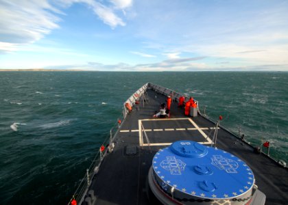 US Navy 110520-N-ZI300-014 Sailors aboard the guided-missile frigate USS Boone (FFG 28) stand ready to drop anchor before arriving in Punta Arenas photo