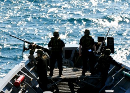 US Navy 110521-N-YM590-062 Sailors aboard USS Anzio (CG 68) stand watch on the ship's forecastle while transiting the Strait of Gibraltar