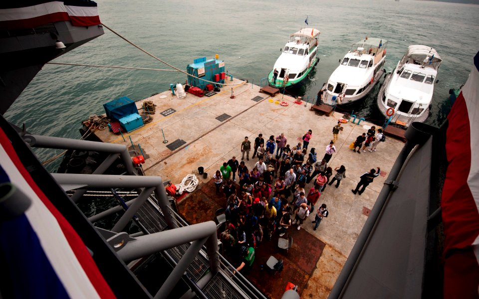 US Navy 110525-N-TU221-669 Guests arrive for tours aboard the Nimitz-class aircraft carrier USS Carl Vinson (CVN 70) during a port visit to Hong Ko