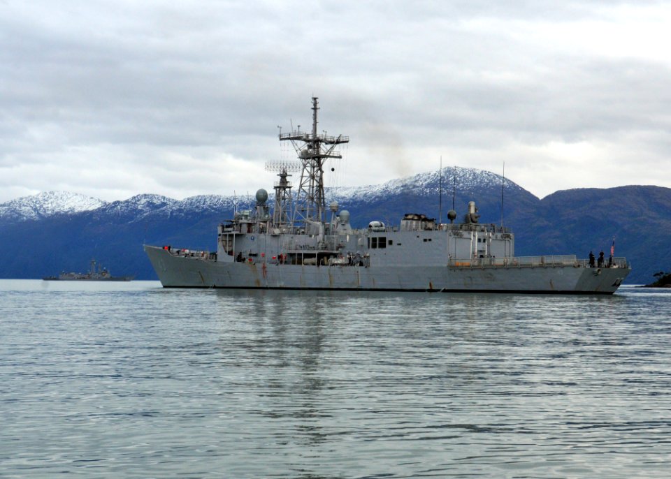 US Navy 110526-N-NL541-258 The Oliver Hazard Perry-class guided-missile frigates USS Boone (FFG 28), left, and USS Thach (FFG 43) are anchored in t