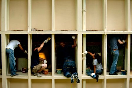 US Navy 110524-N-DR144-818 Sailors assigned to the Nimitz-class aircraft carrier USS Carl Vinson (CVN 70) paint the local distribution center for t