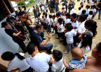 US Navy 110524-N-NY820-720 U.S. Fleet Forces Band members play for school children during a community service event in Manta, Ecuador, in support o