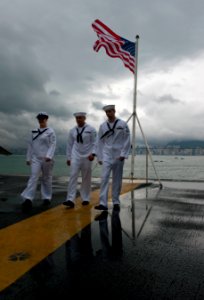 US Navy 110522-N-DR144-472 Airman Kimberly Simmonds, left, Aviation Boatswain's Mate Airman Jorge Santana and Fire Controlman 2nd Class Andrew Rowe