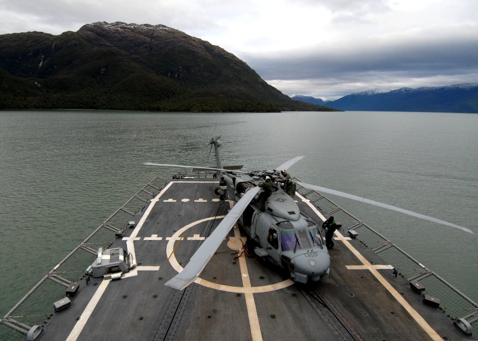 US Navy 110526-N-ZI300-139 Sailors assigned to Anti-Submarine Squadron Light (HSL) 40, Det. 4, conduct maintenance on an SH-60B Sea Hawk helicopter