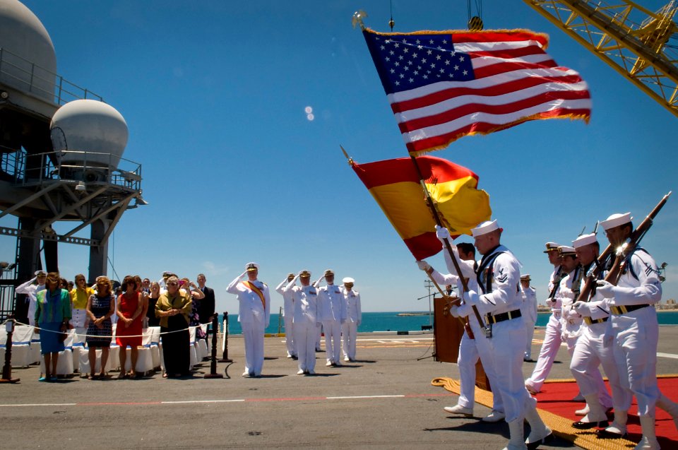 US Navy 110524-N-ZB612-309 The color guard marches on while Chief of Naval Operations (CNO) Adm. Gary Roughead and Spanish navy officials look on