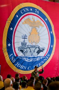US Navy 110523-N-BT887-009 Rear Adm. Joseph Aucoin gives his farewell address during an all-hands call aboard USS John C. Stennis (CVN 74)