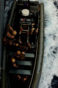 US Navy 110528-N-XO436-010 Marines assigned to the San Antonio-class amphibious transport dock ship USS Mesa Verde (LPD 19) board the Arleigh Burke