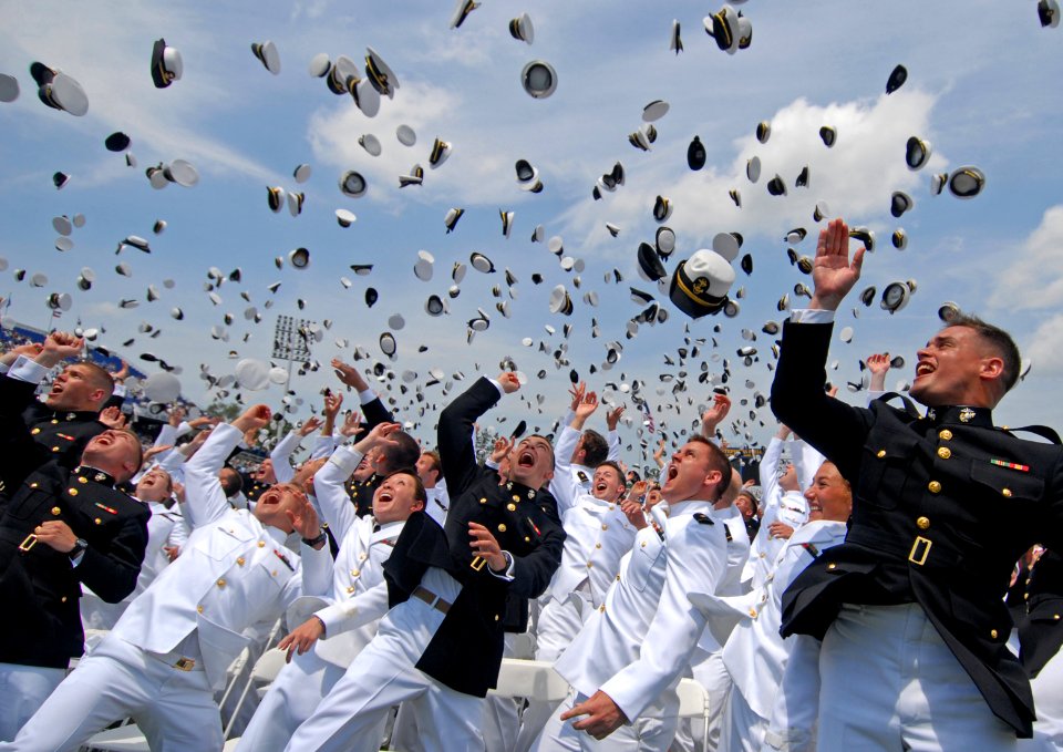 US Navy 110527-N-OA833-014 Newly commissioned Navy and Marine Corps officers toss their hats during the U.S. Naval Academy Class of 2011 graduation photo