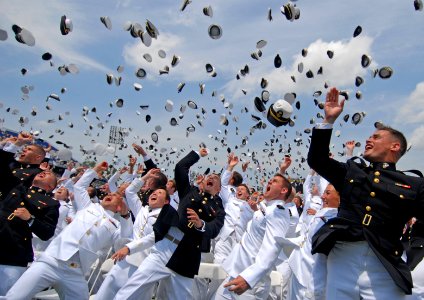 US Navy 110527-N-OA833-014 Newly commissioned Navy and Marine Corps officers toss their hats during the U.S. Naval Academy Class of 2011 graduation