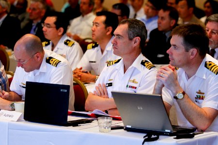 US Navy 110524-N-HW977-073 Naval officers from Australia and Japan listen during the 2011 International Standard Missile Users Group conference