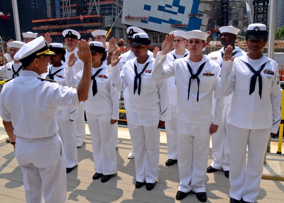 US Navy 110526-N-NN926-029 Rear Adm. Herm Shelanski, commander of Carrier Strike Group (CSG) 10, reenlists Sailors at Ground Zero in Manhattan duri
