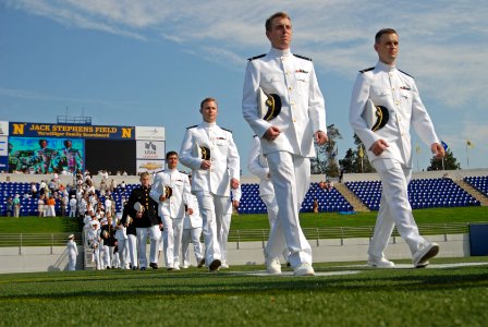 US Navy 110527-N-OA833-002 Midshipmen proceed to their seats before the U.S. Naval Academy Class of 2011 graduation and commissioning ceremony photo