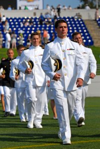 US Navy 110527-N-OA833-003 Midshipmen proceed to their seats before the U.S. Naval Academy Class of 2011 graduation and commissioning ceremony photo