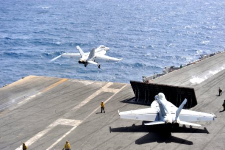 US Navy 110531-N-CH661-189 An F-A-18F Super Hornet assigned to the Checkmates of Strike Fighter Squadron (VFA) 211 launches from catapult three abo