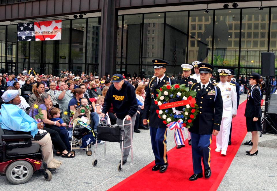 US Navy 110528-N-IK959-170 Rear Adm. David F. Steindl, right, follows a wreath representing the U.S. Armed Forces during a wreath laying ceremony a