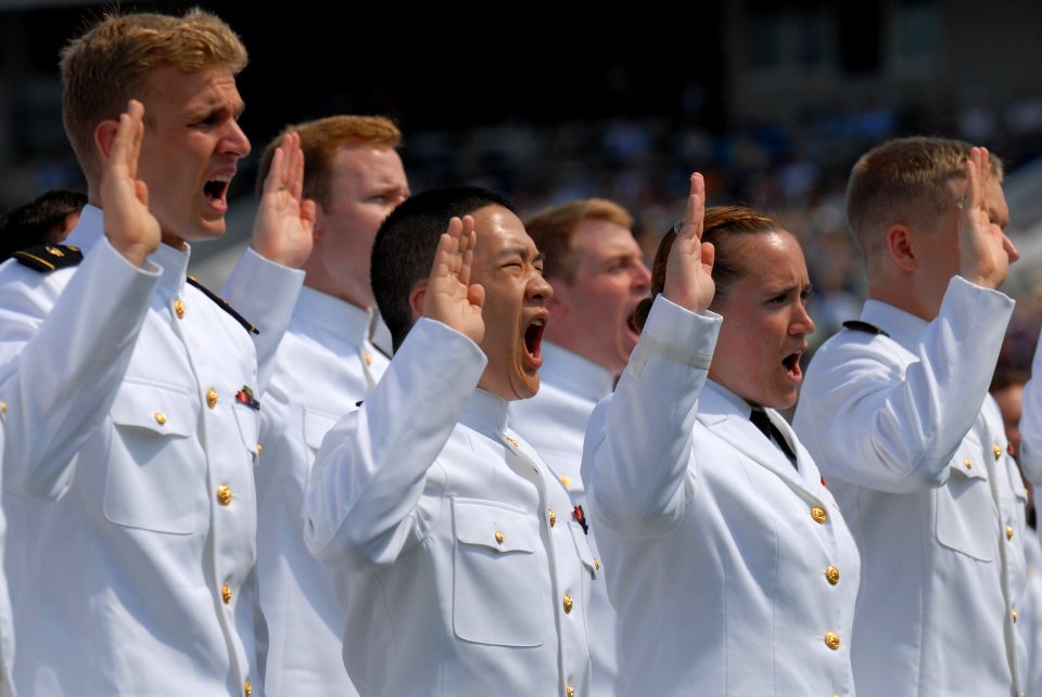 US Navy 110527-N-OA833-011 Navy ensigns take the oath of office during the U.S. Naval Academy Class of 2011 graduation and commissioning ceremony