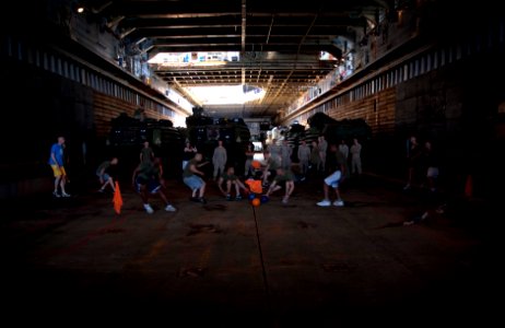 US Navy 110531-N-QP268-180 Marines play a game of dodge ball in the well deck aboard USS Whidbey Island (LSD 41) photo