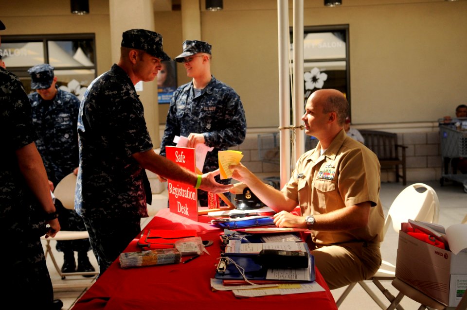 US Navy 110526-N-WP746-029 Fire Control Technician 1st Class Brian Louderback, left, assigned to Commander, Submarine Forces U.S. Pacific Fleet, ro