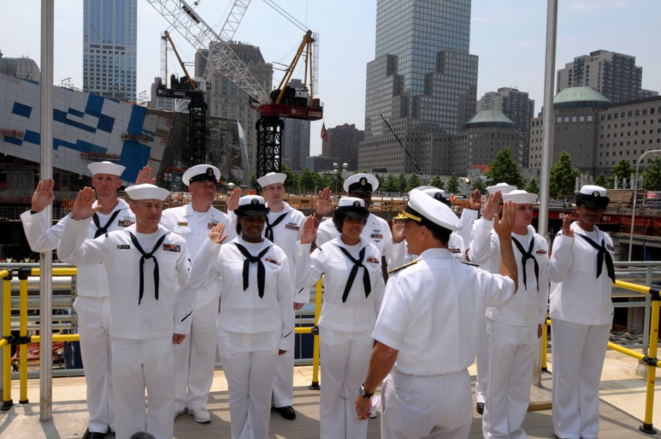 US Navy 110526-N-PS473-081 Rear Adm. Herman Shelanski, commander of Carrier Strike Group (CSG) 10, re-enlists 12 Sailors at Ground Zero during Flee