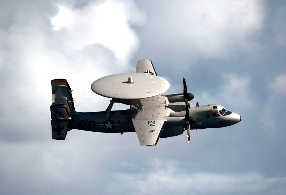 US Navy 110531-N-DR144-619 An E-2C Hawkeye flies past USS Carl Vinson (CVN 70) during an air power demonstration